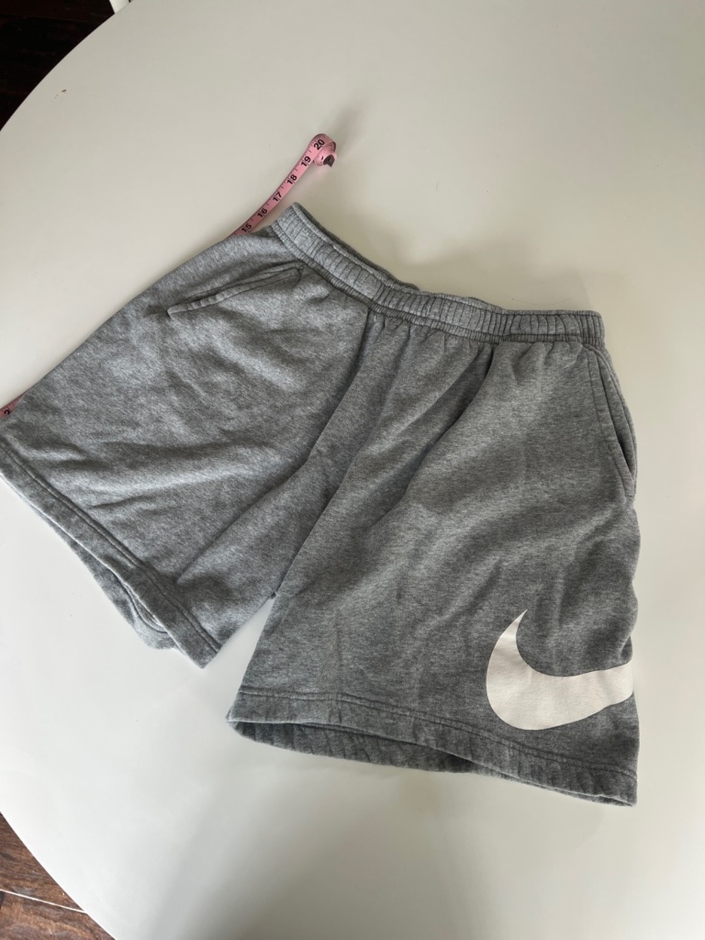Nike Grey Shorts with White Swoosh Logo